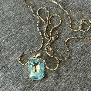 Touchstone crystal pendant